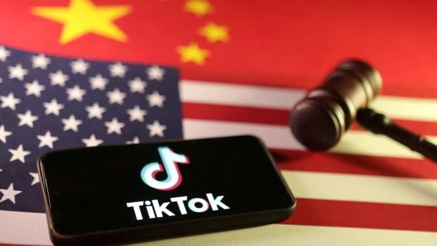 The American and Chinese flags are shown, as well as a gavel and the logo for the company TikTok.