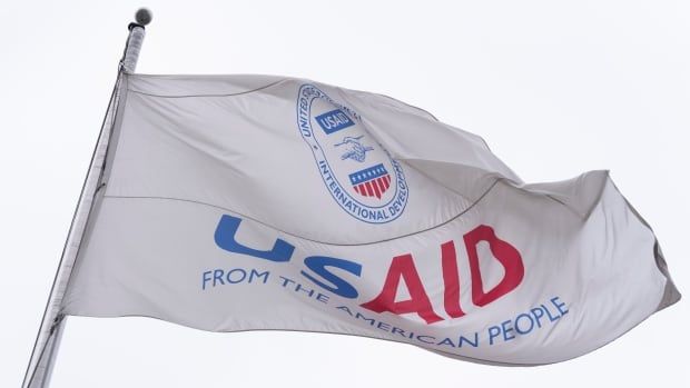 A flag with the words, 'USAID from the American people,' is seen flown.