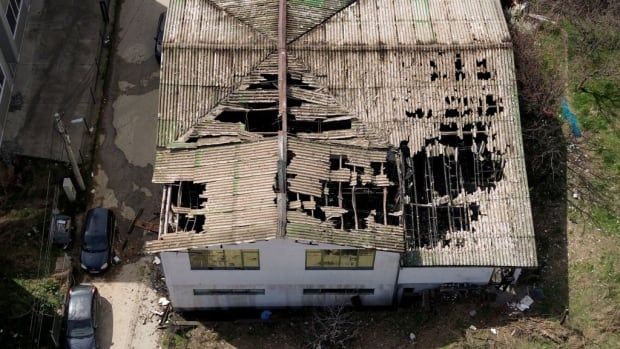 A badly damaged roof.