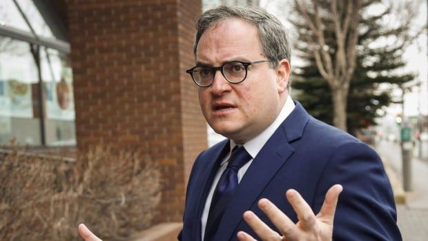 Outspoken political commentator Ezra Levant of Rebel News arrives at the Law Society of Alberta in Calgary on Wednesday, March 2, 2016. A Federal Court judge has upheld the government's decision that far-right media outlet Rebel News doesn't qualify for journalism tax credits because it doesn't produce enough original news.