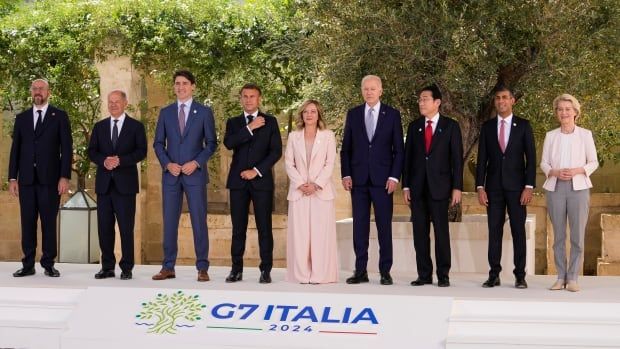 From left, European Council President Charles Michel, German Chancellor Olaf Scholz, Canada's Prime Minister Justin Trudeau, French President Emmanuel Macron, Italian Prime Minister Giorgia Meloni, U.S. President Joe Biden, Japan's Prime Minister Fumio Kishida, Britain's Prime Minister Rishi Sunak and European Commission President Ursula von der Leyen pose for a group photo during a G7 world leaders summit at Borgo Egnazia, Italy, Thursday, June 13, 2024.