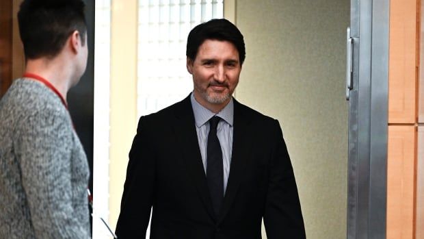 Prime Minister Justin Trudeau arrives to sign a book of condolences for former U.S. President Jimmy Carter at the U.S. Embassy in Ottawa, on Friday, Jan. 3, 2025.