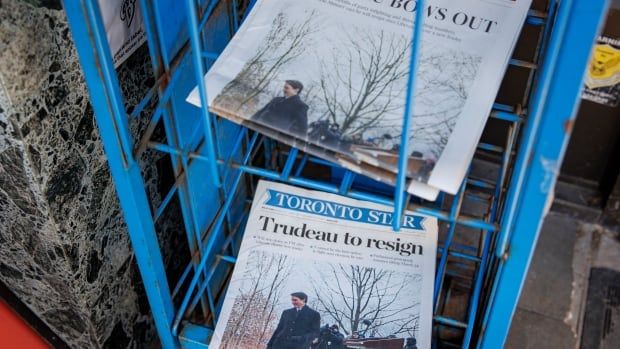 News of Prime Minister Justin Trudeau’s resignation is pictured on the front page of newspapers on display at a Toronto book shop on Jan. 7, 2025.