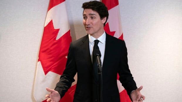 Prime Minister Justin Trudeau speaks to the media after a meeting with The National Association of Manufacturers, in Washington, Thursday, Jan. 9, 2025.