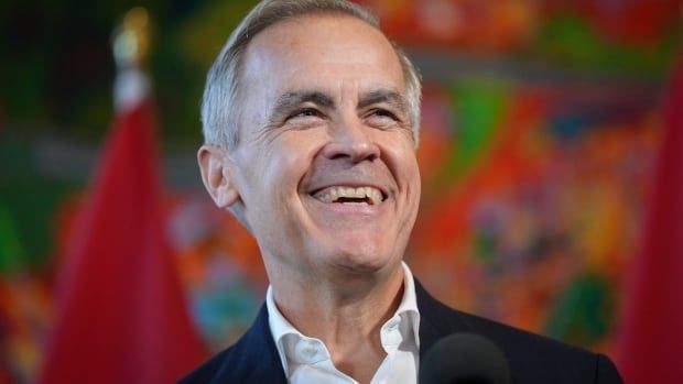 Former Bank of Canada governor Mark Carney laughs while speaking to reporters at the Liberal caucus retreat in Nanaimo, B.C., on Tuesday, September 10, 2024.