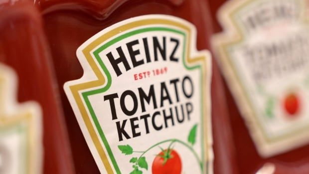 A bottle of Heinz ketchup.