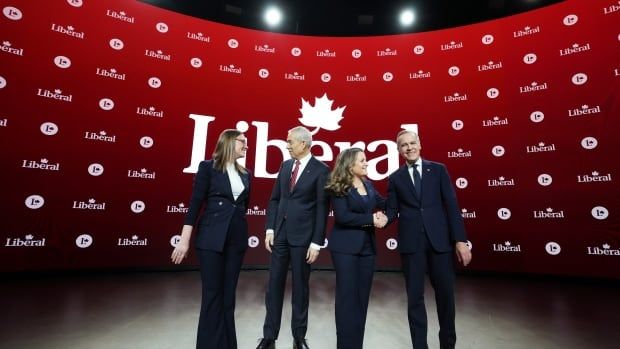 Liberal Party of Canada leadership candidates Karina Gould, Frank Baylis, Chrystia Freeland and Mark Carney greet one another prior to the English-language Liberal Leadership debate in Montreal on Tuesday, Feb. 25, 2025. The Federal Liberals will pick a new leader on March 9.