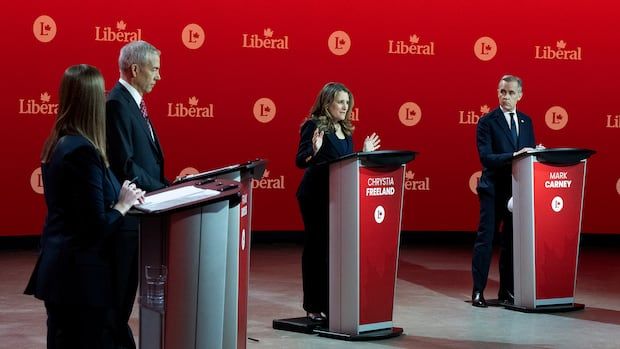 4 people appear on a debate stage