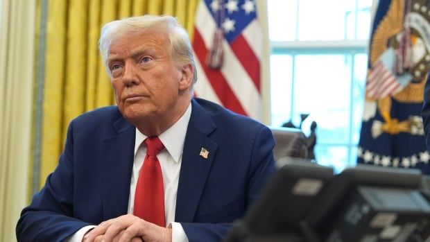 U.S. president Donald Trump at his desk.