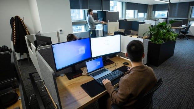 Amazon workers at their desks in the Vancouver headquarters 