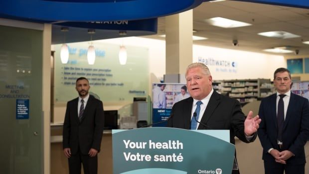 Ontario Premier Doug Ford speaks during a press conference at a Shoppers Drug Mart pharmacy in Toronto. 