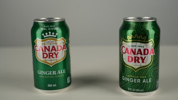 Two cans of Ginger Ale stand side by side. One says "Made from Real Ginger" on the can, the other doesn't.