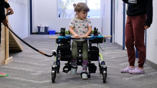 A child using a Trexo Walker.