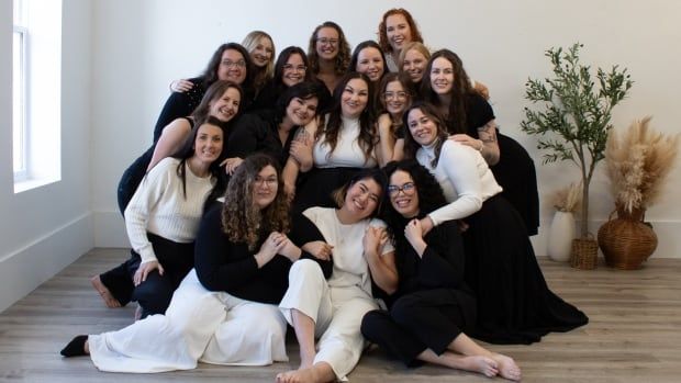 London doula Amy Silva, in the second row centre, founded Collaborative Doula Collective, which is made up of 51 doulas from across Ontario, who specialize specializing in birth, postpartum, end-of-life care and other disciplines. 