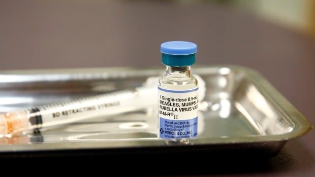 A vial of the measles, mumps, and rubella (MMR) vaccine is pictured at the International Community Health Services clinic in Seattle, Washington, U.S., March 20, 2019. Picture taken March 20, 2019.  REUTERS/Lindsey Wasson