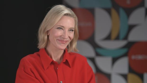 Cate Blanchett smiles for an interview.