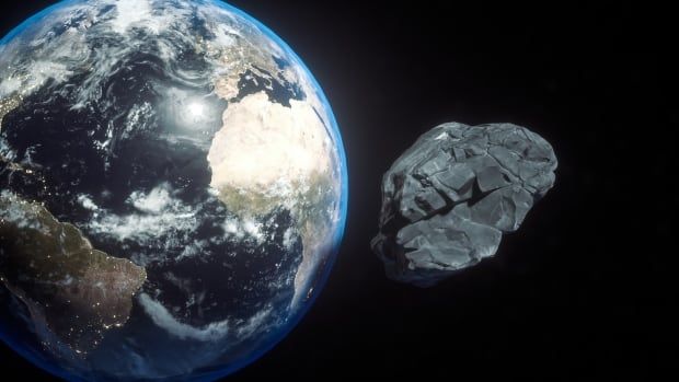 A rocky body is seen approaching Earth from space.