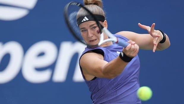 Czech tennis player Karolina Muchova returns a shot against Beatriz Haddad Maia of Brazil during their U.S. Open women's quarterfinal match at USTA Billie Jean King National Tennis Center on Sept. 4, 2024 in New York. 