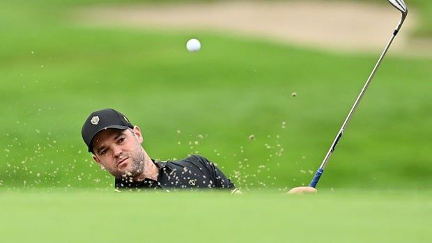 Canadian golfer Corey Conners, a member of the International team for the Presidents Cup, plays a bunker shot during a practice round on Sept. 24, 2024 at The Royal Montreal Golf Club.