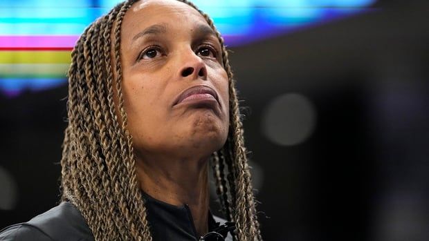 Chicago Sky head coach Teresa Weatherspoon looks at the scoreboard during a WNBA game against the New York Liberty on June 4, 2024, in Chicago.