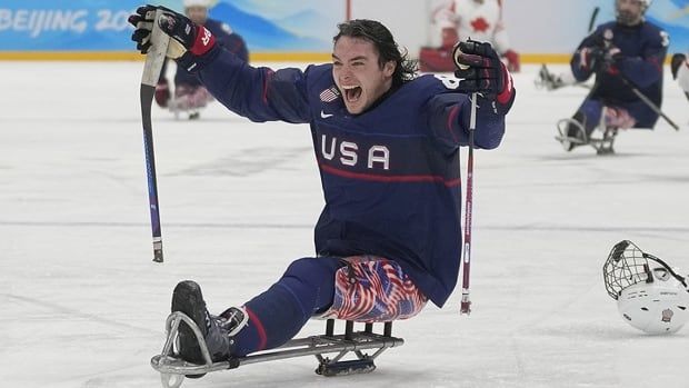 Jack Wallace of the United States celebrates after his team defeated Canada in their Para hockey gold-medal game at the Paralympics in Beijing, China on March 13, 2022.