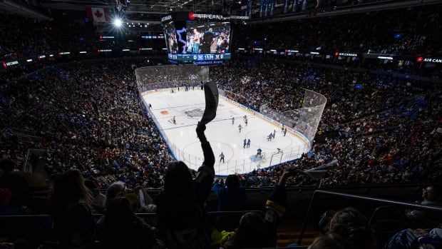 A general view as a fan cheers as Toronto plays Montreal during their PWHL hockey game at Scotiabank Arena on February 16, 2024 in Toronto, Canada.