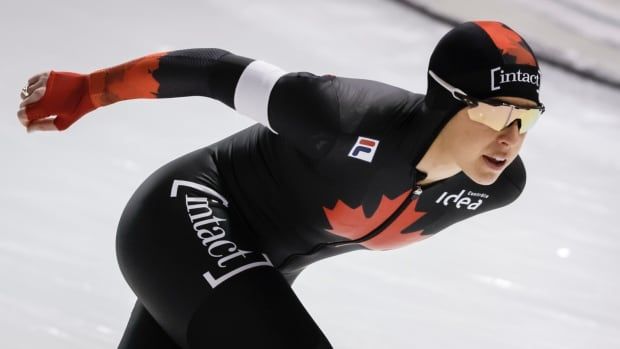 A speed skater competes.