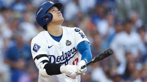 Shohei Ohtani of the Los Angeles Dodgers watches his pop fly to be out against the New York Yankees in the first inning during Game 2 of the World Series at Dodger Stadium on Oct. 26, 2024 in California.