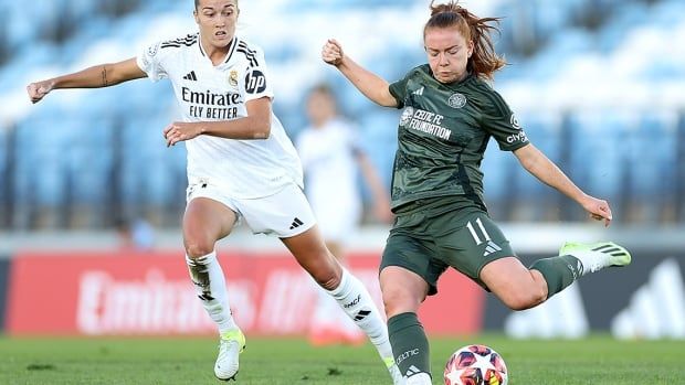 Colette Cavanagh of Celtic passes the ball under pressure from Filippa Angeldal of Real Madrid during a UEFA Women's Champions League match at Estadio Alfredo Di Stefano on Oct. 17, 2024 in Madrid, Spain.