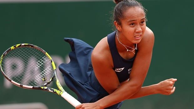 Canadian women's tennis player Leylah Fernandez serves against Wang Xiyu of China in second-round play of the French Open at Roland Garros on May 30, 2024 in Paris. 