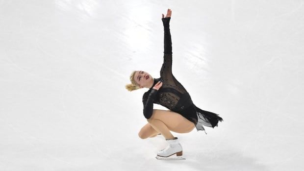 A women's figure skater performs.