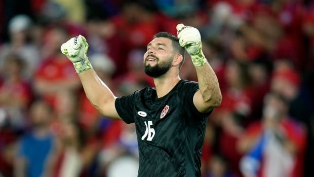 Canadian male soccer goalkeeper celebrates at the end of a Copa America Group A soccer match against Chile, Saturday, June 29, 2024, in Orlando, Fla. (AP Photo/John Raoux)