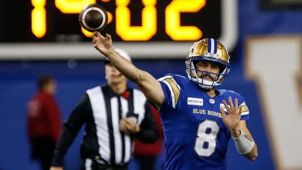 Male Winnipeg Blue Bombers quarterback  throws against the Saskatchewan Roughriders during the first half of CFL Western Conference Final action in Winnipeg Saturday, November 9, 2024. 