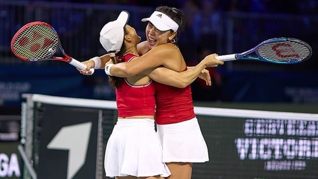 Shuko Aoyama and Eri Hozumi of Japan celebrate after winning the Billie Jean King Cup Finals group stage doubles match against Romania on Nov. 14, 2024 in Malaga, Spain. 