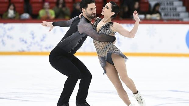 Maxime Deschamps of Quebec and Chicago's Deanna Stellato-Dudek perform their short program in the pairs competition at the Finlandia Trophy in Helsinki, Finland on Nov. 15, 2024. 