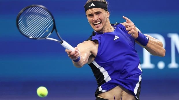 German tennis player Alexander Zverev returns a shot against Brandon Nakashima of the United States during their U.S. Open fourth-round men's singles match at USTA Billie Jean King National Tennis Center on Sept. 1, 2024 in New York.