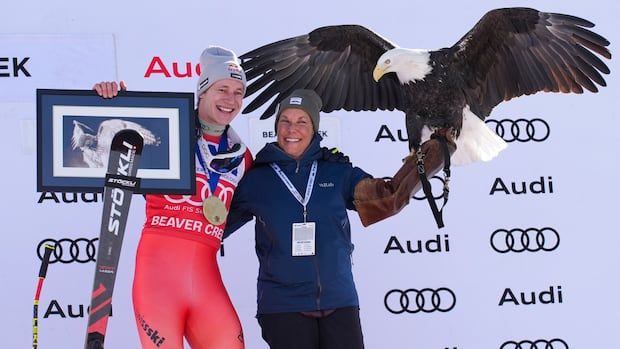 Marco Odermatt celebrates his victory in the men's super-G ski race in Beaver Creek.