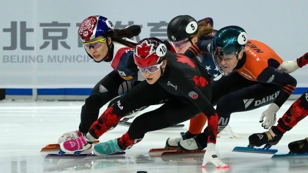 Women's skaters compete.