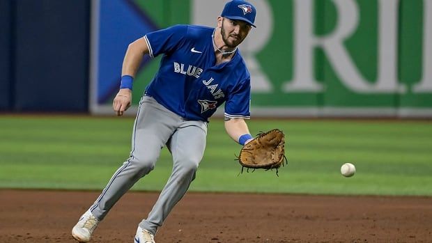 Toronto Blue Jays first baseman Spencer Horwitz reaches for an infield grounder during a Sept. 21, 2024 MLB regular-season game against the hometown Tampa Bay Rays in St. Petersburg, Florida.