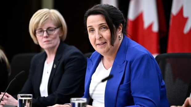 Justice Lise Maisonneuve, who will lead the Future of Sport in Canada Commission, participates in a news conference with Minister of Sport and Physical Activity Carla Qualtrough, at the National Press Theatre in Ottawa, on Thursday, May 9, 2024.