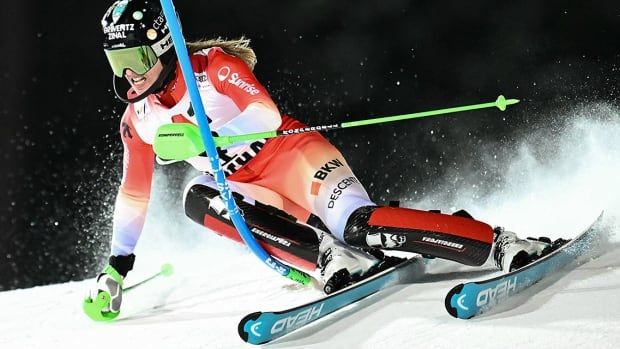 Skier Camille Rast of Switzerland competes during the first run a women's World Cup slalom in Flachau, Austria on January 14, 2025. 