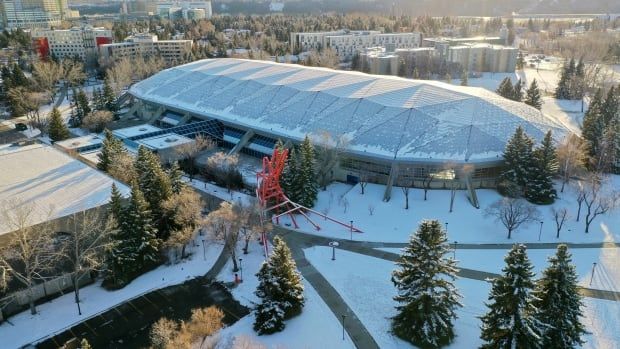 A snow-covered building is shown from above.