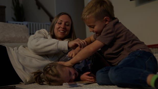 Rachel woman, woman, with two of her kids