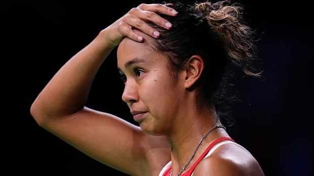 Canadian women's tennis player Leylah Fernandez places her right hand on the top of her head, reacting during her match against Katie Boulter of Britain at the Billie Jean King Cup Finals in Malaga, southern Spain, on November 17, 2024. 