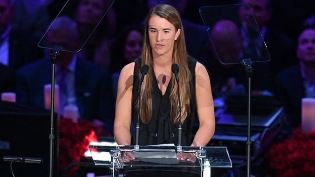 Women's basketball player Sabrina Ionescu speaks during a February 24, 2020 memorial to celebrate the life of NBA legend Kobe Bryant and daughter Gianna Bryant at Staples Center in Los Angeles.