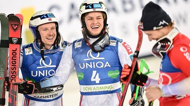 From left: Second-placed Henrik Kristoffersen, Norwegian teammate and winner Alexander Steen Olsen, and third-placed Marco Odermatt of Switzerland celebrate after Tuesday's World Cup giant slalom in Schladming, Austria. 