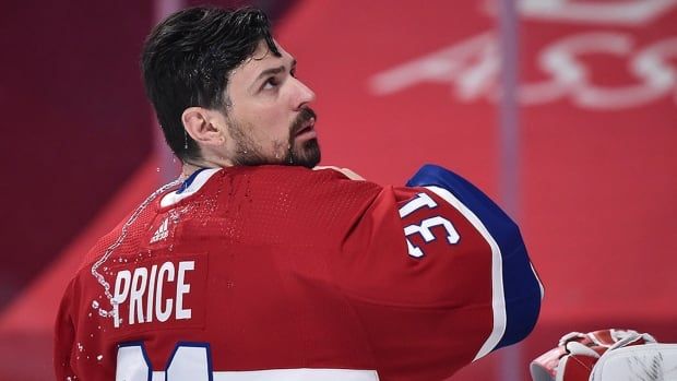 Montreal Canadiens goalie Carey Price sprays water on himself prior to the start of Game 4 of a second-eound Stanley Cup playoff series against the Winnipeg Jets on June 7, 2021 at the Bell Centre in Montreal. 