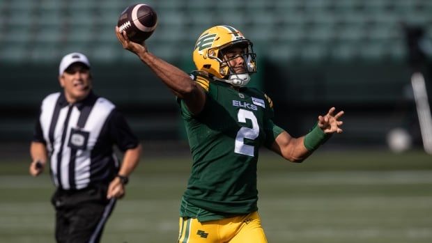 Edmonton Elks male quarterback makes the throw against the B.C. Lions during first half CFL action in Edmonton, Sunday, Aug. 11, 2024.