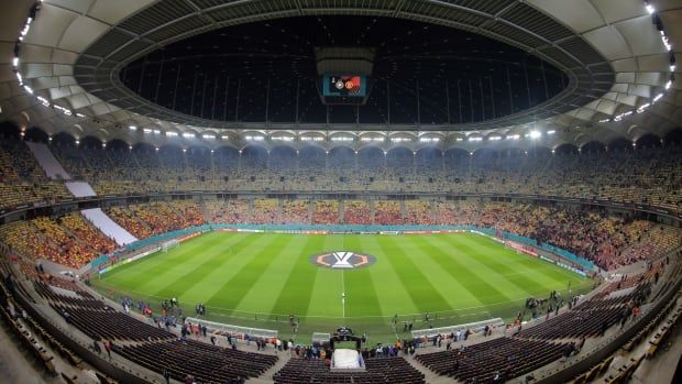 A panoramic view of a soccer stadium.