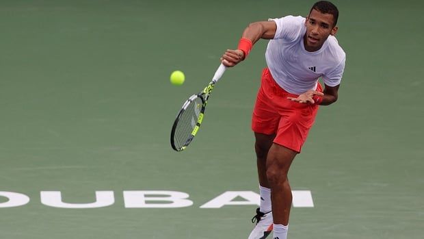 Canadian athlete Felix Auger-Aliassime in action during his Round of 16 match against Portugal's Nuno Borges at the Dubai Tennis Championships on February 26, 2025.